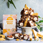 Pebbly Path Honeycomb Highway Rocky Road 200g box with handcrafted chocolate rocky road pieces, honeycomb chunks, marshmallows and roasted almonds displayed on a dessert stand