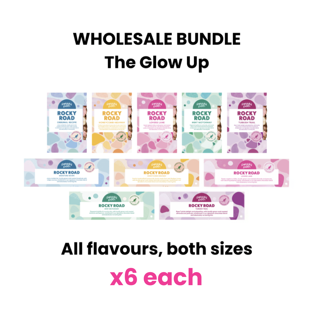 Pebbly Path Glow Up Wholesale Bundle showing all five rocky road flavours in both bar sizes, with six of each product displayed as a wholesale assortment.