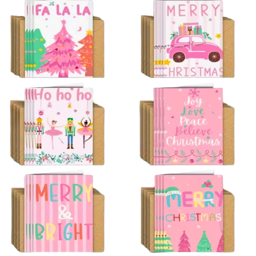 Pebbly Path greeting card collection featuring six pink-themed Christmas card designs with festive illustrations including Christmas trees, a car carrying presents, nutcracker and ballerina characters, holiday typography, and matching kraft envelopes.
