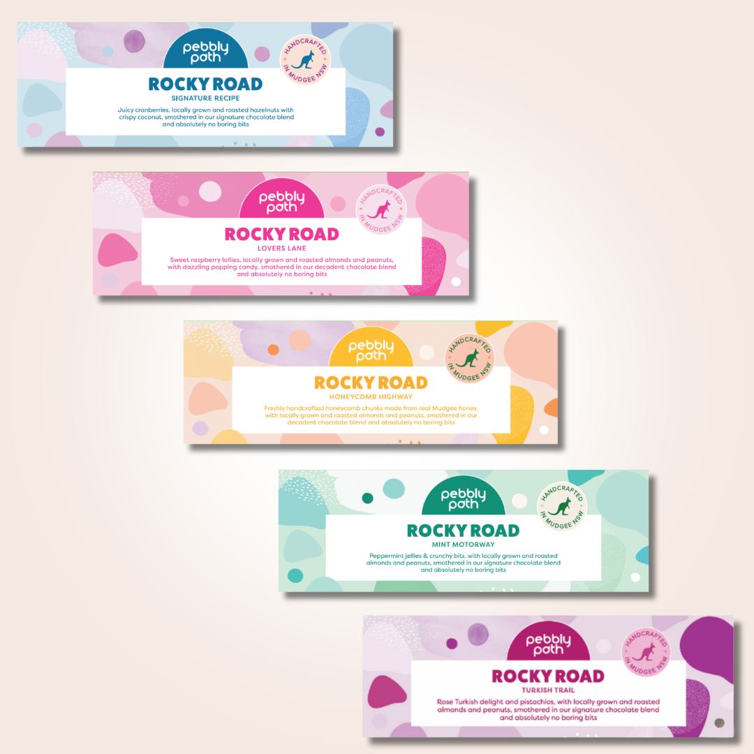 Pebbly Path Bundle & Save 100g Mini Tasting Pack featuring five rocky road bars including Signature Recipe, Lovers Lane, Honeycomb Highway, Mint Motorway and Turkish Trail displayed together as a tasting selection.