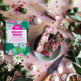 Pebbly Path Pavlova Parkway rocky road 200g box and rocky road pieces arranged with meringue, pistachios and raspberries.