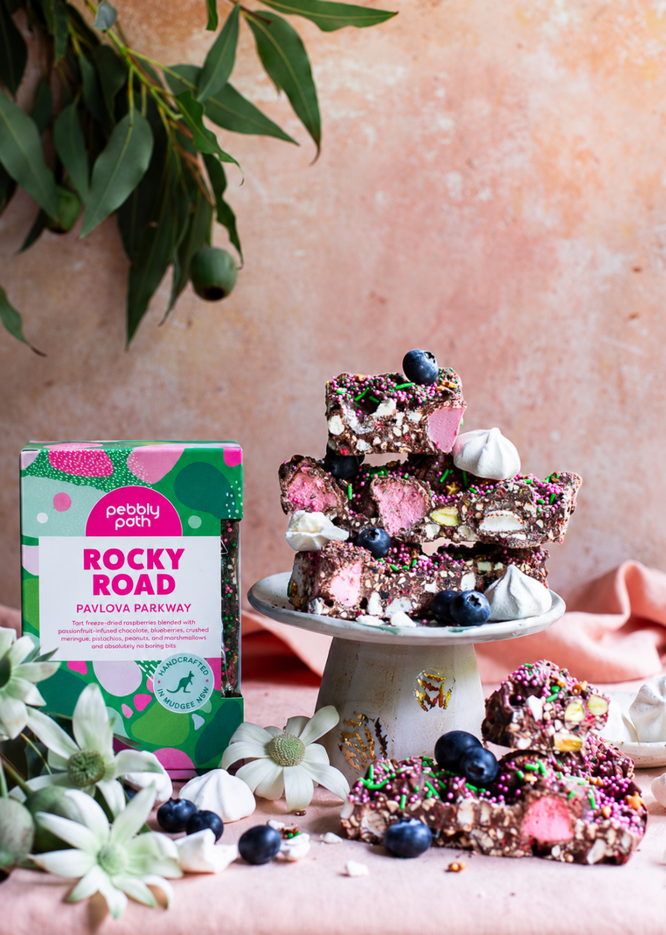 Pebbly Path Pavlova Parkway rocky road 200g displayed with rocky road pieces, blueberries and meringue.