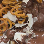Pebbly Path Salted Caramel Causeway Rocky Road handmade production process with jersey caramels, crunchy pretzels, fluffy marshmallows and salted chocolate being mixed and prepared by hand